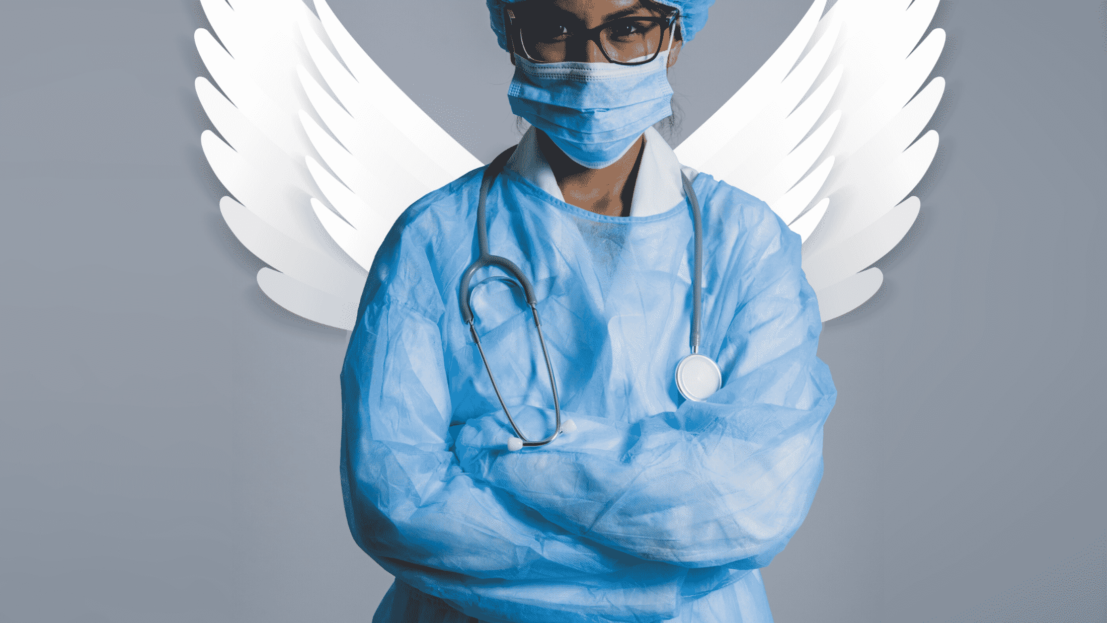 Doctor in protective gear with angel wings behind her