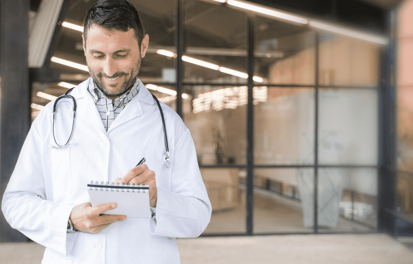 male doctor going through a checklist